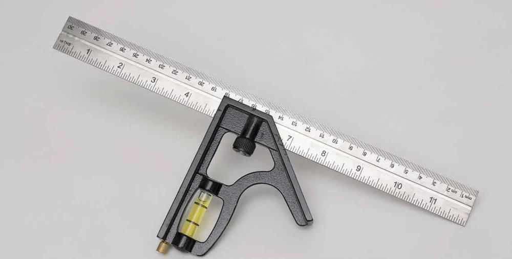 Maplewoodshop photograph of a combination square with a metal rule and sliding head.