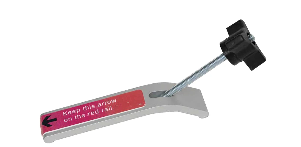 Maplewoodshop photograph of a bench hold-down arm with a threaded knob and red rail-position label.